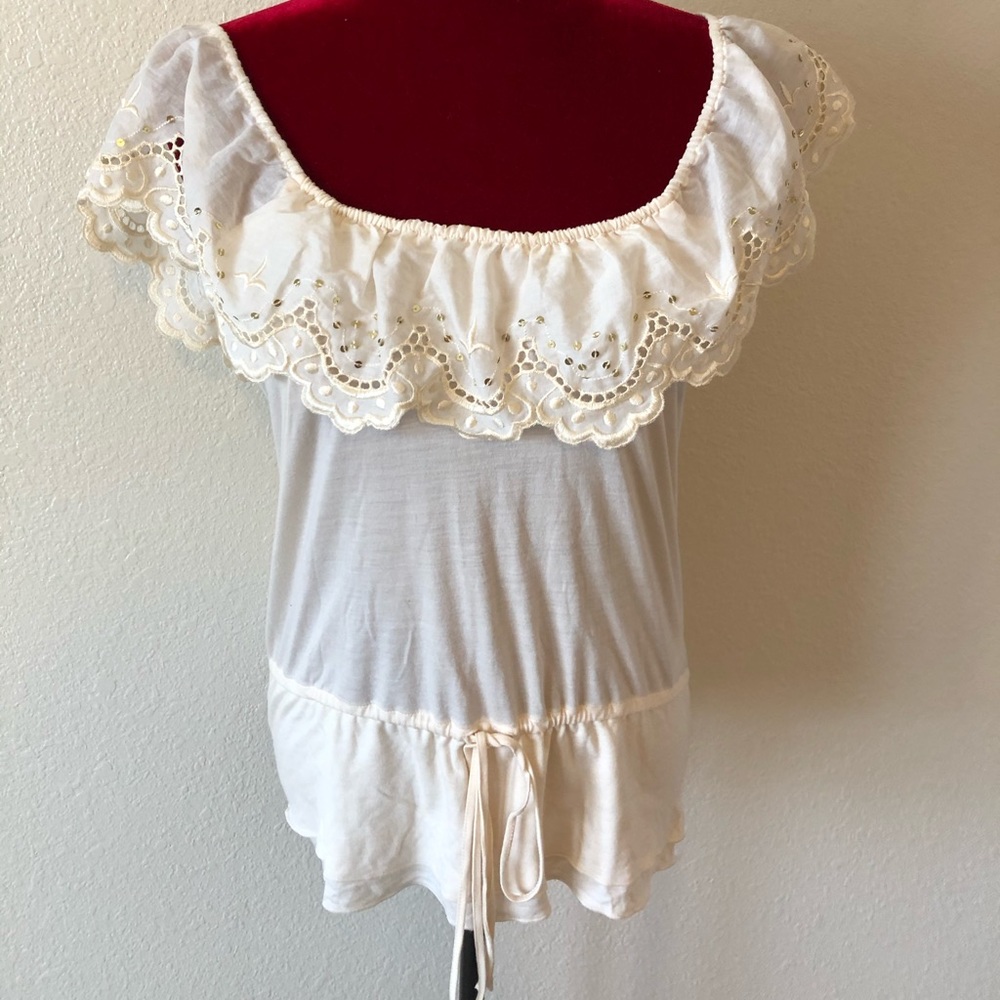 Ruffled off the shoulder blouse.